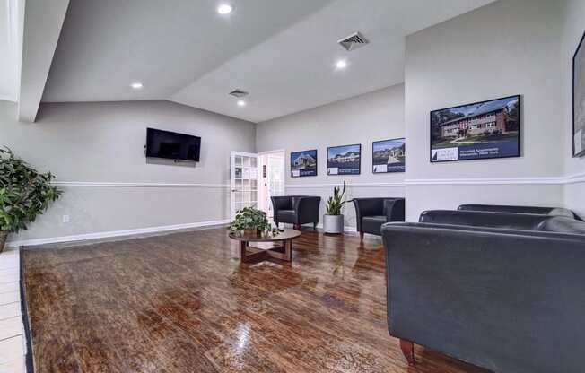 a living room with couches and a coffee table