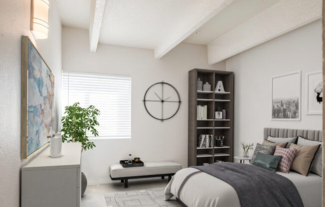 a bedroom with a bed and a clock on the wall