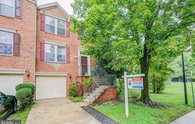 Lovely end unit three level townhome.