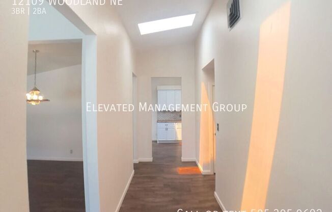 12109 WOODLAND NE