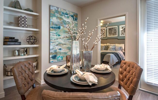 a living room filled with furniture and a large window