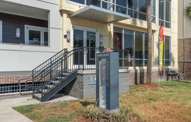 the front of a building with a sign in front of it