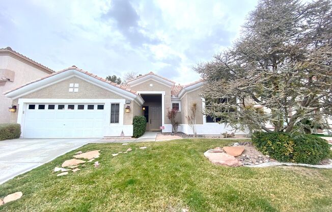 Single story home in guard gated Rhodes Ranch Community with an open kitchen in a great room, a large backyard with a covered patio, and all hard flooring throughout(tile & LVP). Community amenities available to tenants such as the club house, gym, basket