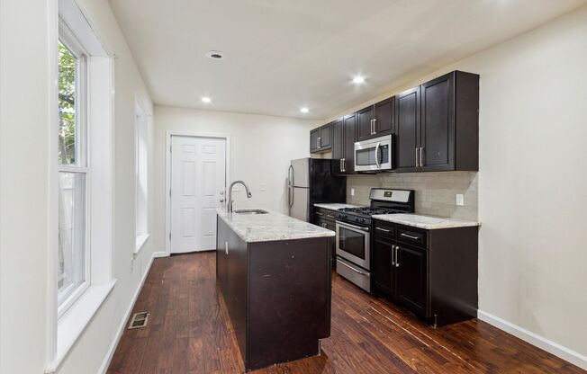 Spacious 5-Bedroom Home with Modern Upgrades and Private Patio in North Philadelphia