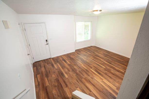 Living Room at Devonshire Court Apartments & Townhomes, North Logan, UT