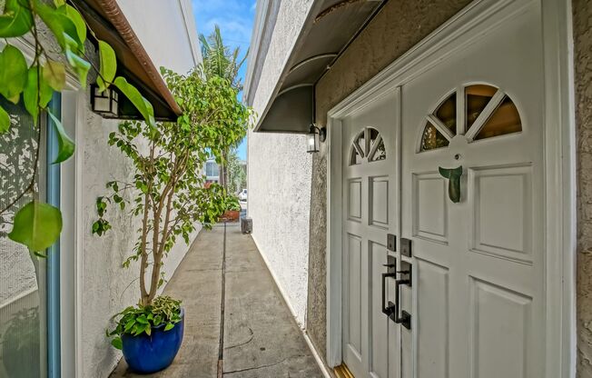 RECENTLY REMODELED, BRIGHT & AIRY 3BR2BA GOLDEN HILLS HOME W/ BRIGHT & OPEN GREAT ROOM LIVING SPACE, 2 BALCONIES & FENCED YARD NEAR THE RB/HB BORDER CLOSE TO SCHOOLS, SHOPPING, RESTAURANTS & JUST 5 MINS TO BEACH!