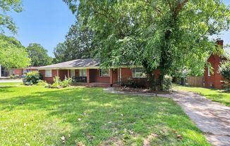 Freshly Updated Duplex with Fenced Backyard!