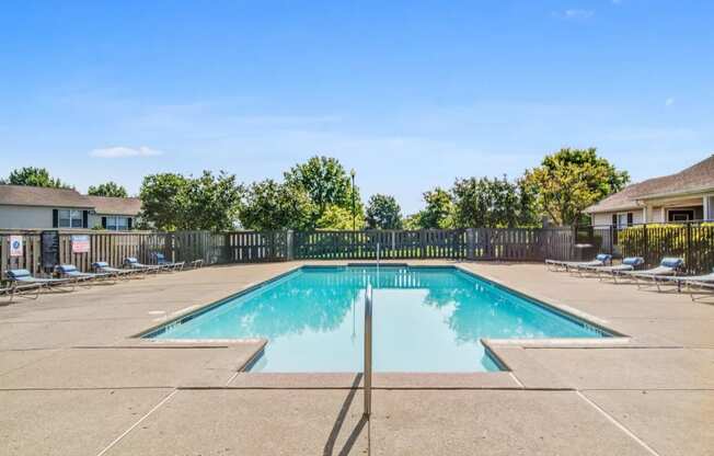 Sparkling community swimming pool available to residents at Parklight Townhomes