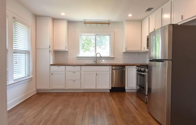 Darling 2 bedroom 1 bath brick cottage Tudor.