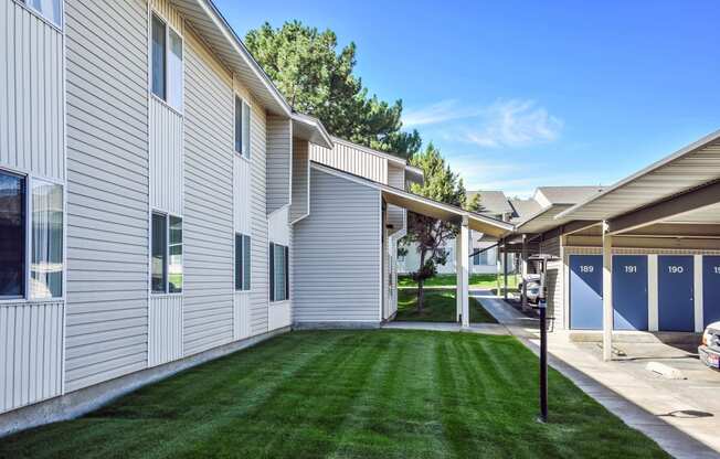 Kirkwood Meadows building surrounded by green grass and a blue sky in Pocatello, ID