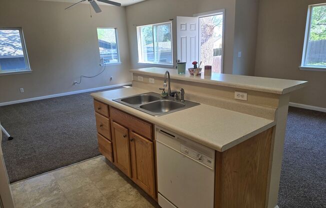 Three-bedroom condo in Denver boasts a large private yard and many additional features!