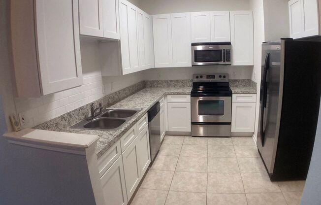 Spacious 3-Bedroom Condo with Pond Views & Designer Touches