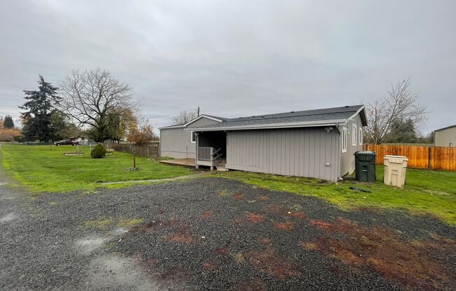 A rare find! Do not miss this 3 bedroom home with a Large Shop in the country!