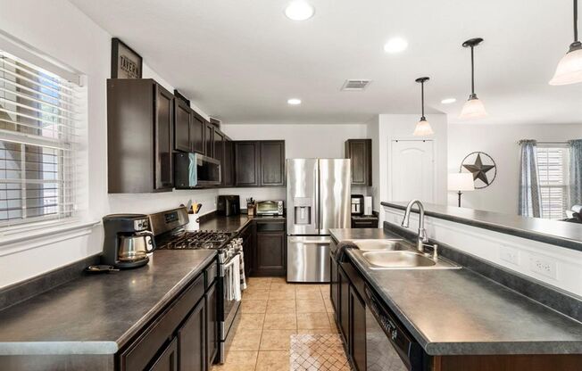 Welcome to this beautifully maintained home in Kyle’s sought-after Plum Creek community!