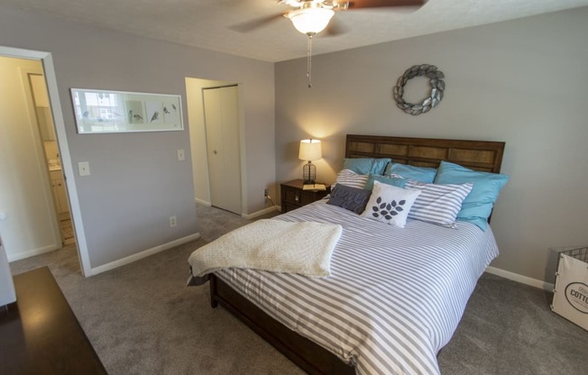 This is a photo of the bedroom in the 740 square foot 1 bedroom model apartment at Compton Lake Apartments in Mt. Healthy, OH.