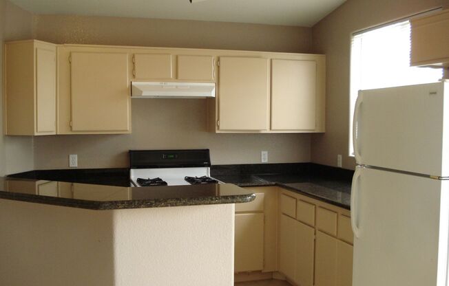 2 Bedroom Condo! All Tiled Living Area!