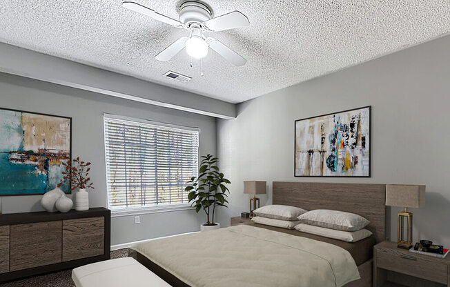 a bedroom with a bed and a ceiling fan