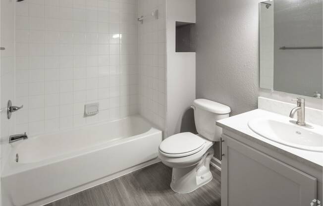 Renovated Apartment Home Bathroom at Fernwood Grove Apartments in Tampa Florida