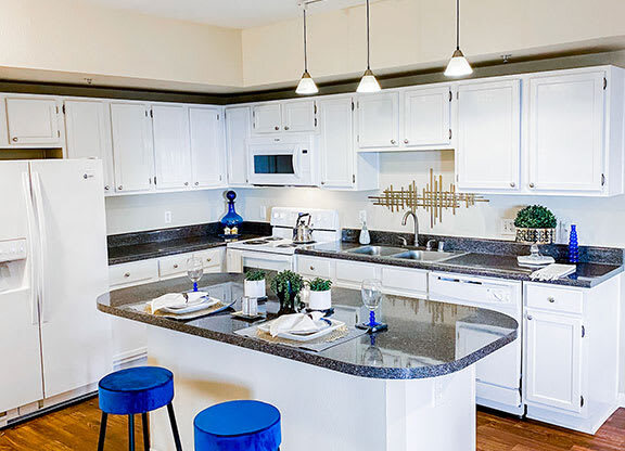 Gourmet kitchen with island at The Villas at Katy Trail in Uptown Dallas, TX, For Rent. Now leasing Studio, 1, 2 and 3 bedroom apartments.