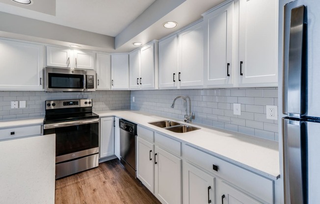 Kitchen with White Cabinetry and Upgraded Hardware