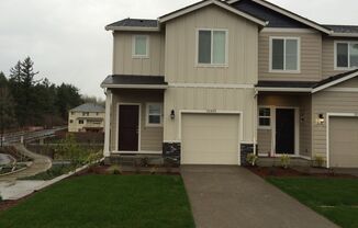 Stylish 3-Bedroom Bethany Residence with Open-Concept Living, Fenced Yard, and Attached Garage