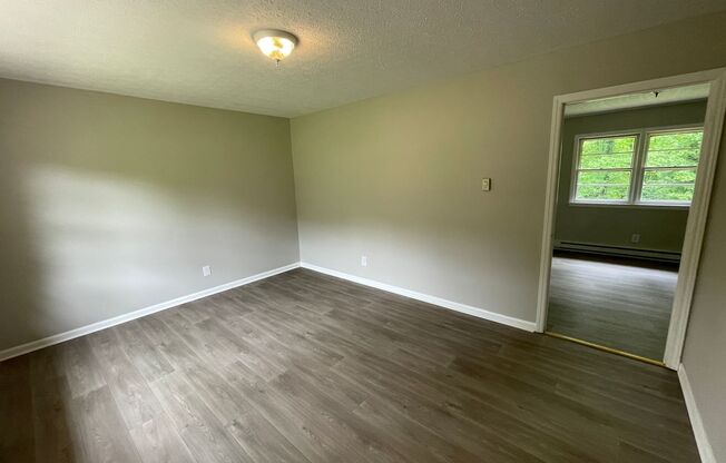 3 bedroom 1 bath brick ranch house.    Freshly Painted- New Flooring