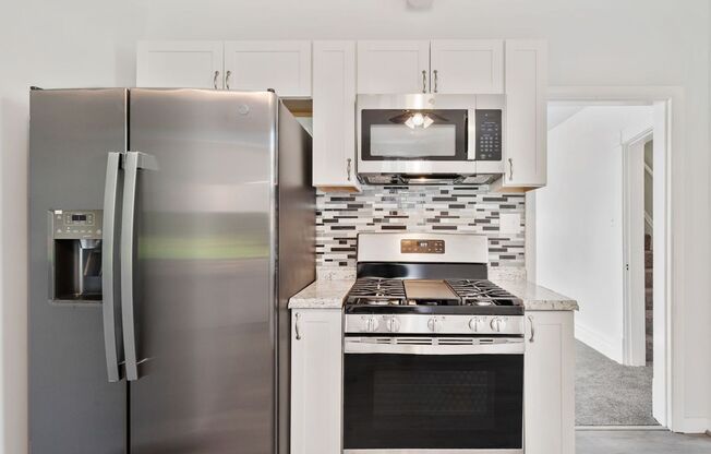 Newly Renovated 2 Bedroom Home With Bonus Space.  Available Immediately.