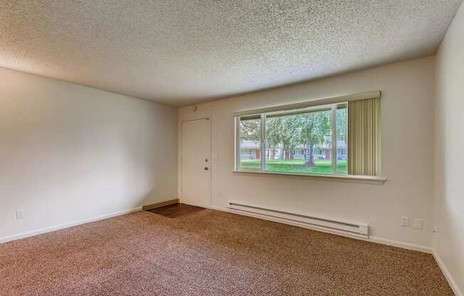 The Living Room in a One Bedroom Apartment at Morningtree Park Apartments