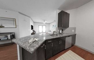 Townhomes feature fully-equipped kitchens with granite countertops