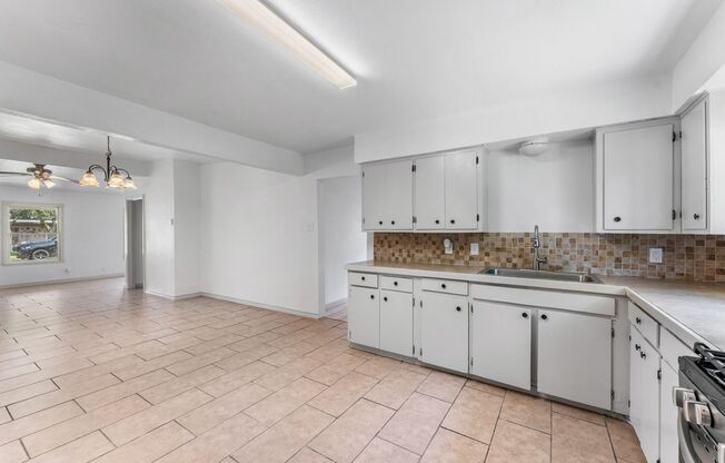 CENTRAL CITY FOUR BEDROOM TWO BATH HOUSE!