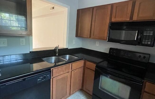 Must see this adorable 2 bedroom 1.5 bath townhouse located off Commonwealth Ave