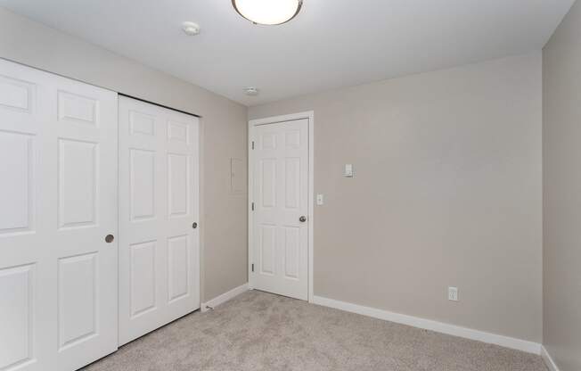 Novela Apartments Bedroom and Closet Door