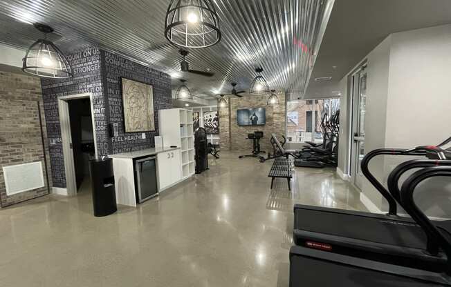 a view of the inside of a gym with a treadmill and other gym equipment at Edge 35, Indianapolis