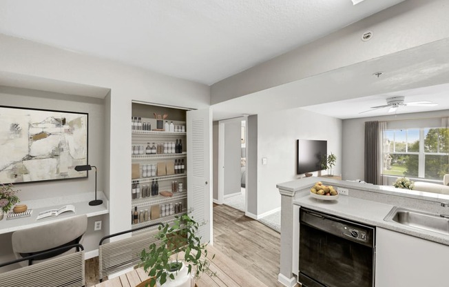 an open floor plan with a living room and a kitchen