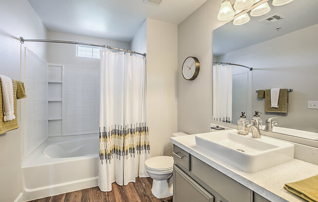 Indulge in luxury at The Michael B: where every detail, from the sleek fixtures to the spa-like bathtub, transforms your daily routine into a tranquil escape.at The Michael B Townhomes and Flats, Las 