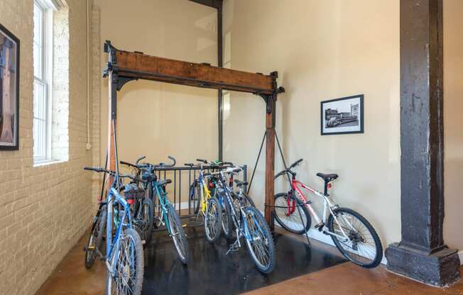 a group of bikes parked in a room at Mayton Transfer Lofts, Petersburg, VA 23803