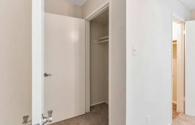 This is a photo of the one of the bedroom closets in the 650 square foot 1 bedroom, 1 bath apartment at Preston Park Apartments in Dallas, TX