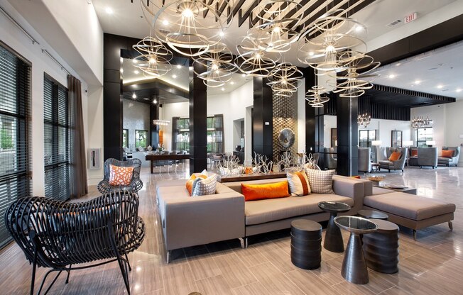 the lobby of a hotel with couches and chairs at North Creek, Hutto, Texas