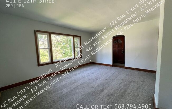 411 E 12 ST