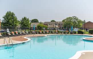 our apartments offer a swimming pool with chaise lounge chairs
