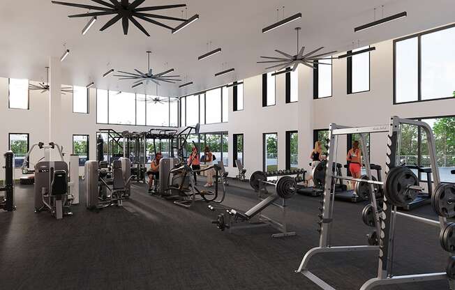 a gym with a lot of exercise equipment and windows