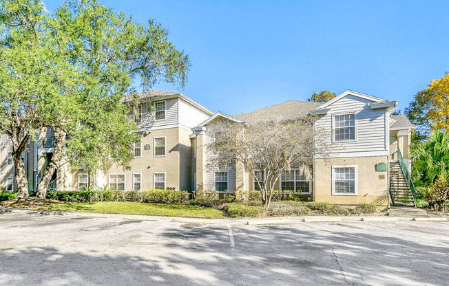 Building exterior with parking lot and native landscaping