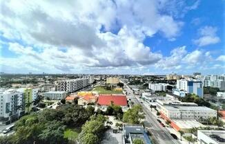 a view of a city from the roof of a building