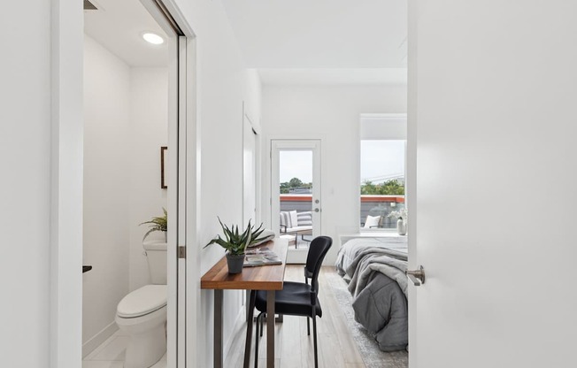 A small room with a table and chairs.