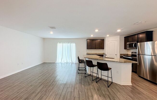 Spacious Open-Concept Living with Modern Finishes in Villate 7 Poinciana