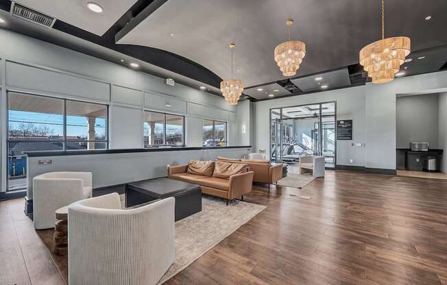 A modern living room with a large window and a view of the outdoors.