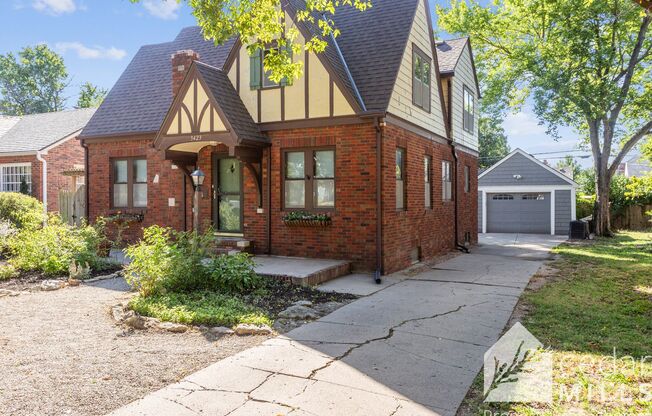 Tudor Style 4 Bedroom in historic MacDonald Neighborhood!