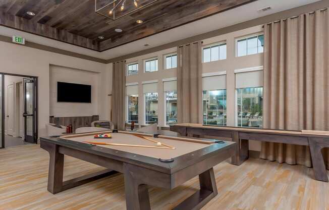 Game Room with Pool Table and Shuffle Board