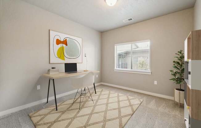 A room with a desk, chair, and a painting on the wall.