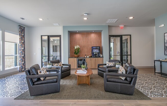 Step into the inviting lounge at Sage at Celina Residences, where modern design meets comfort. Relax in stylish seating or connect with neighbors in this vibrant space. Don't miss out on your chance to call this community home; schedule a visit today!